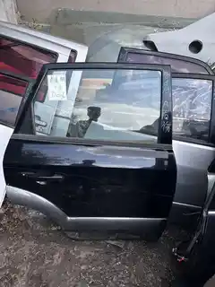 Tucson · Modelo antigo · Porta traseira direita
