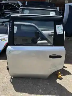 Livina · Left rear door · minor damage