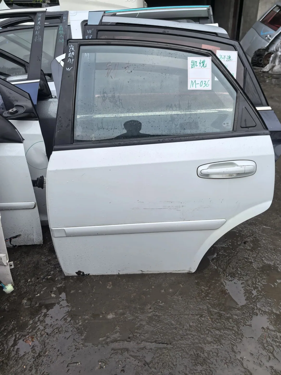 06 Buick Excelle · ประตูหลังซ้าย · มีแถบกันกระแทก
