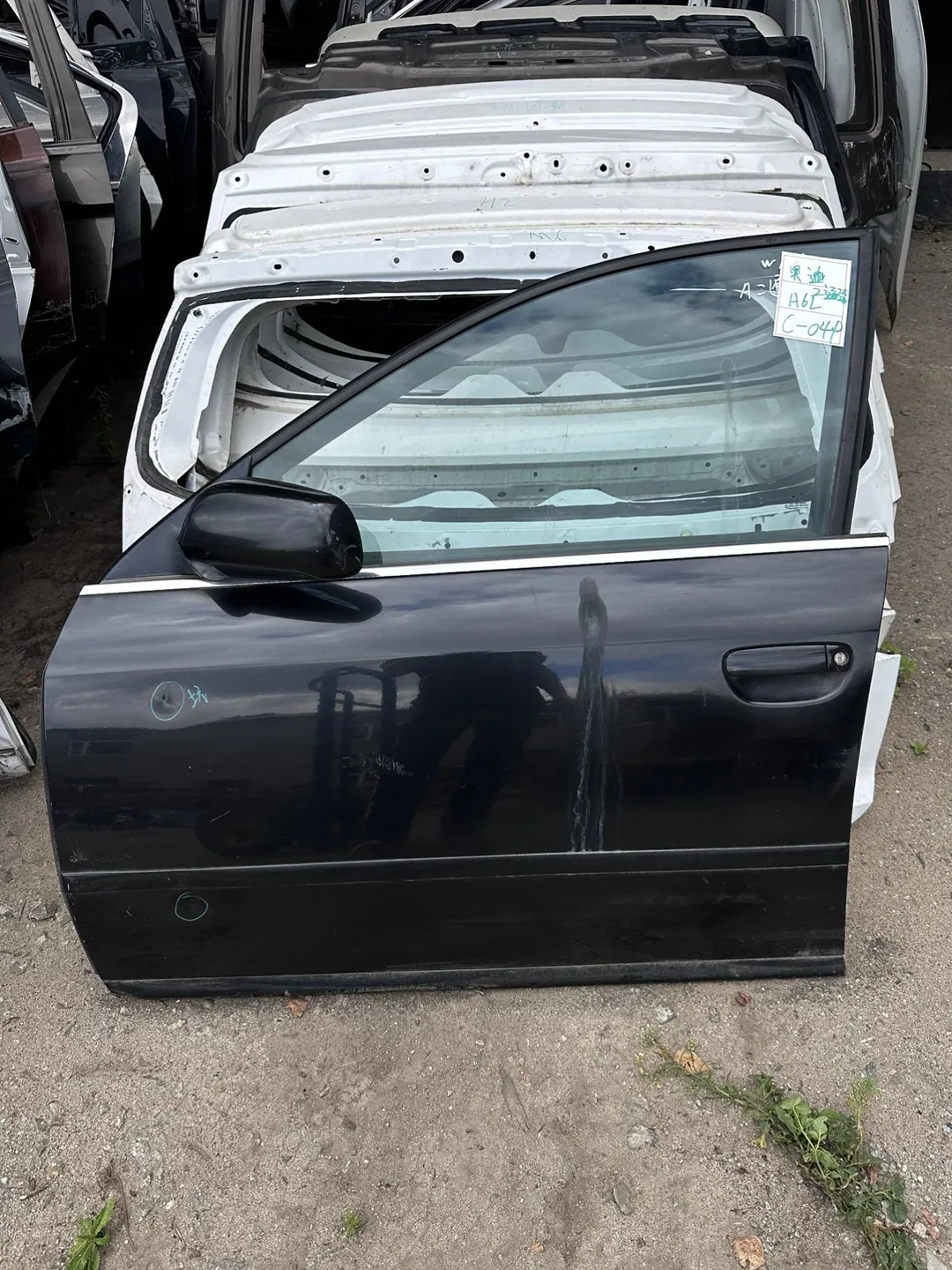 باب أمامي أيسر · Audi A6L · معاد الطلاء · منبعج