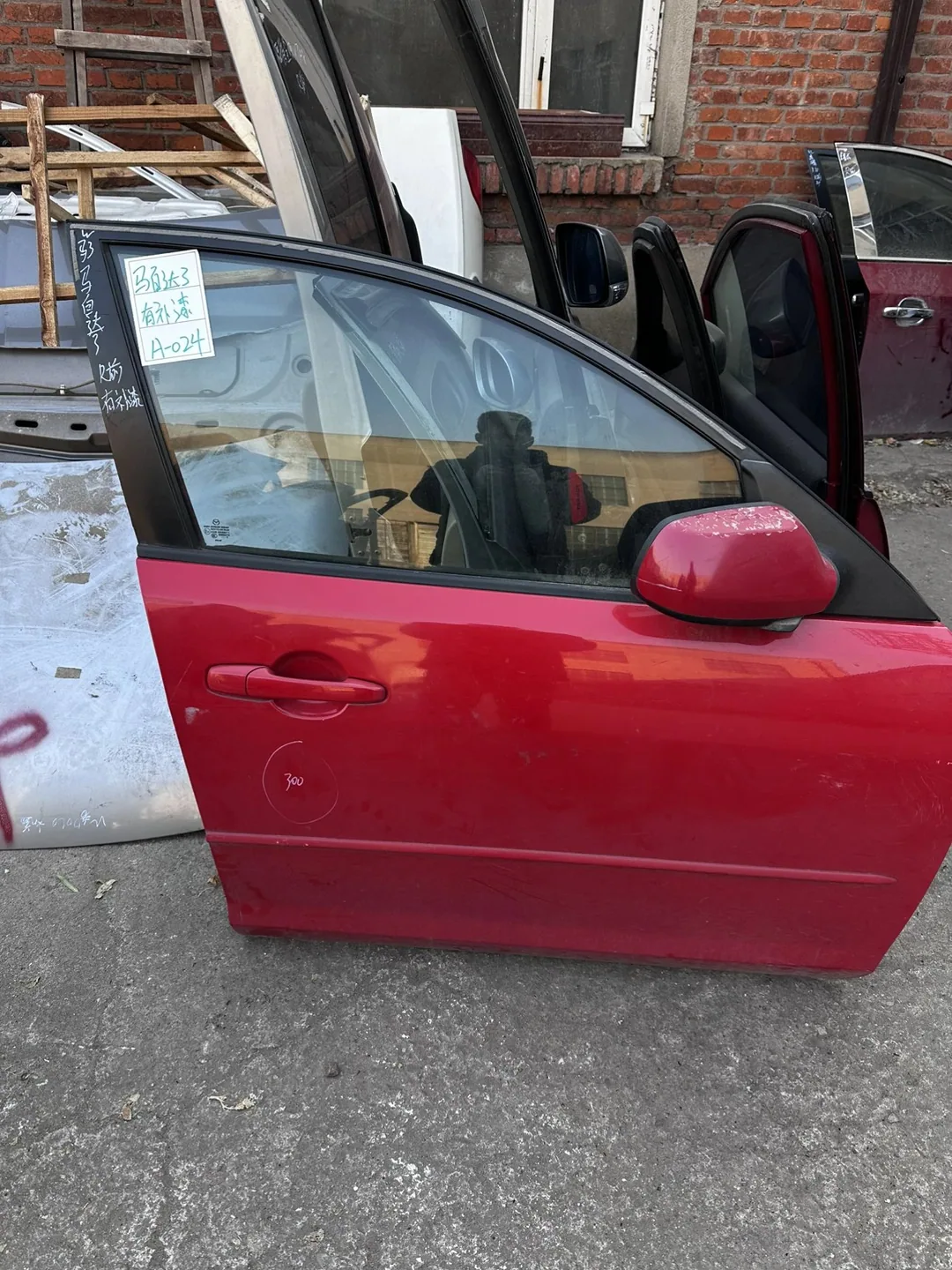 Mazda 3 · Porte avant droite · repeint