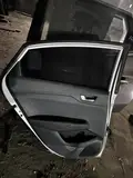 Hyundai Verna · Puerta trasera izquierda · con daños 5
