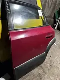 Hyundai Tucson · Modelo antigo · Porta traseira esquerda 2