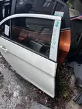 Suzuki Alivio · Puerta trasera derecha 2