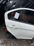 Suzuki Alivio · Puerta trasera derecha 3