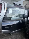 Tucson · Modelo antigo · Porta traseira direita 2