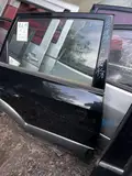 Tucson · Modelo antigo · Porta traseira direita 3