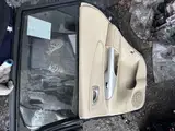 Tucson · Modelo antigo · Porta traseira direita 4