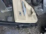 Tucson · Modelo antigo · Porta traseira direita 6