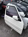 باب أمامي أيمن · 05 Volkswagen Jetta · منبعج 3