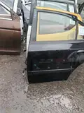 Hyundai Elantra · Puerta trasera izquierda · repintado 2