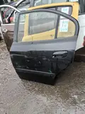 Hyundai Elantra · Puerta trasera izquierda · repintado 3