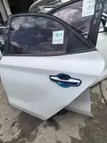 17 Hyundai Verna · Porte arrière gauche · bosselé 3