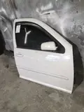 05 Volkswagen Bora · Puerta delantera derecha 2