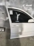 05 Volkswagen Bora · Puerta delantera derecha 3