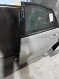 Excelle · Puerta trasera izquierda 3