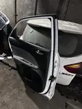 Kia Pegas · Puerta trasera izquierda 5