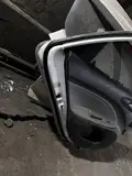 Kia Pegas · Puerta trasera izquierda 6