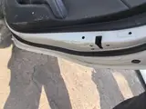 17 Kia K2 · Right rear door · dented 4