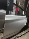 Verna · Porta traseira esquerda · repintado 2