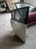 Tiida · Porta traseira direita 2