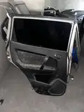Geely GX7 · Puerta trasera izquierda 4