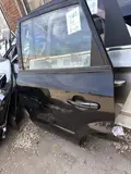 13 Tucson · Puerta trasera izquierda 2